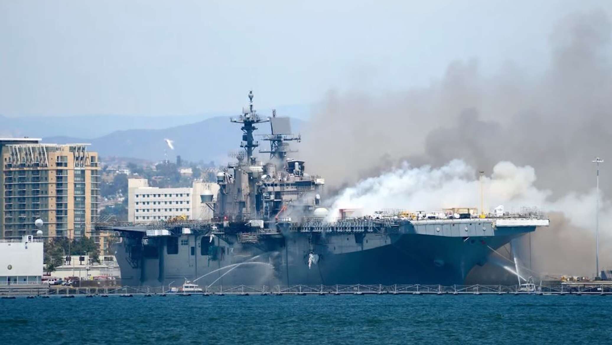 Чп корабли. Battleship Fire Civilians. Pier Side at the Naval Base.