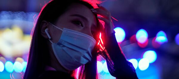 Участница косплея в маске на выставке ChinaJoy в Шанхае  - Sputnik Абхазия