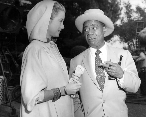 Актриса Грейс Келли с Луи Армстронгом во время съемок в Лос-Анджелесе, 1956 год - Sputnik Абхазия