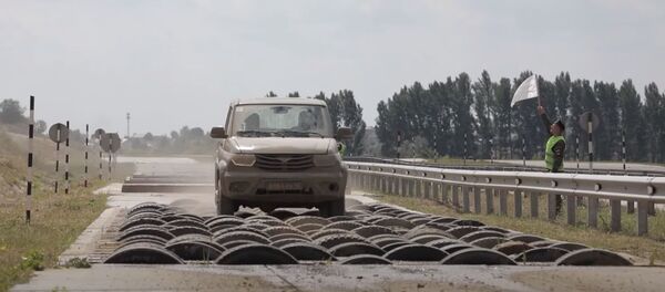 Первые тренировочные заезды участников конкурса «Мастера автобронетанковой техники-2020» Первые тренировочные заезды участников конкурса «Мастера автобронетанковой техники-2020» - Sputnik Абхазия