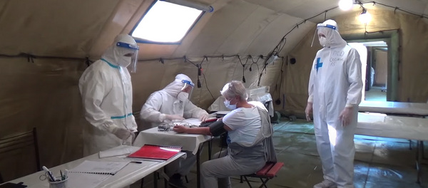 Работа военно-медицинских специалистов ЮВО в мобильном госпитале в Абхазии Работа военно-медицинских специалистов ЮВО в мобильном госпитале в Абхазии - Sputnik Абхазия