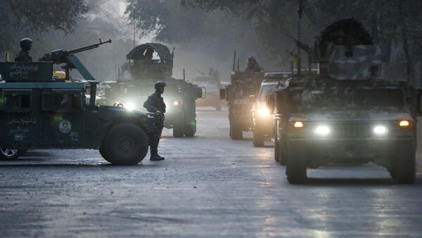 Афганские силовики на месте происшествия после вооруженного нападения на университет в Кабуле, Афганистан - Sputnik Абхазия