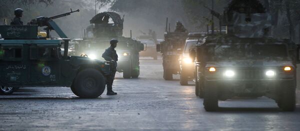 Афганские силовики на месте происшествия после вооруженного нападения на университет в Кабуле, Афганистан - Sputnik Абхазия