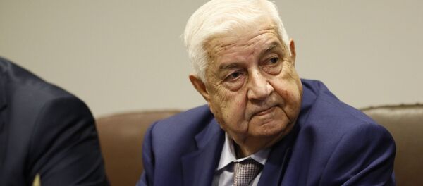 Министр иностранных дел Сирии Валид Муаллем во время встречи с министром иностранных дел РФ Сергеем Лавровым в рамках 74-й сессии Генеральной Ассамблеи Организации Объединенных Наций (ООН) в штаб-квартире ООН в Нью-Йорке. Министр иностранных дел Сирии Валид Муаллем во время встречи с министром иностранных дел РФ Сергеем Лавровым в рамках 74-й сессии Генеральной Ассамблеи Организации Объединенных Наций (ООН) в штаб-квартире ООН в Нью-Йорке. - Sputnik Абхазия