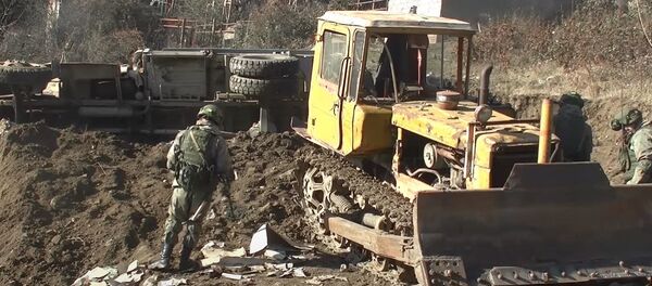 Разминирование местности и восстановление линий электропередач в Нагорном Карабахе Разминирование местности и восстановление линий электропередач в Нагорном Карабахе - Sputnik Абхазия