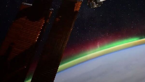 Внеземная красота: российский космонавт снял северное сияние - Sputnik Абхазия