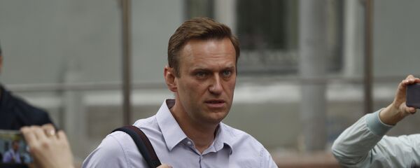 Лидер российских протестов Алексей Навальный прибыл в суд после ареста во время недавней акции протеста в Москве, Россия, во вторник, 15 мая 2018 г. Тверской районный суд Москвы приговорил Навального к 30 суткам тюремного заключения за организацию несанкционированной акции протеста в столице России в начале этого месяца Лидер российских протестов Алексей Навальный прибыл в суд после ареста во время недавней акции протеста в Москве, Россия, во вторник, 15 мая 2018 г. Тверской районный суд Москвы приговорил Навального к 30 суткам тюремного заключения за организацию несанкционированной акции протеста в столице России в начале этого месяца - Sputnik Абхазия