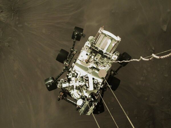 Фотографии, снятые исследовательским аппаратом NASA's Perseverance Mars Rover, который совершил посадку на Марсе в ночь на 19 февраля - Sputnik Абхазия