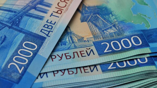 Банкноты номиналом 2000 рублей. - Sputnik Аҧсны