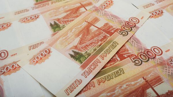 Банкноты номиналом 5000 рублей. - Sputnik Аҧсны