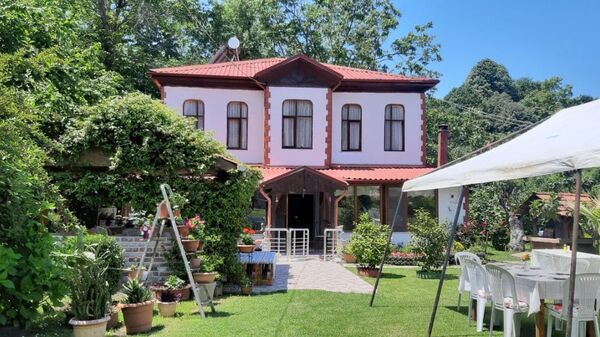 Столетний дом Али Куадзба в селе Есмаханым в Турции - Sputnik Аҧсны