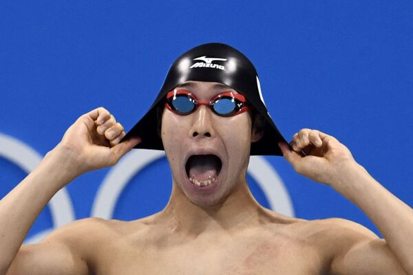 Японский пловец Хагино Косукэ готовится к участию в полуфинале мужского заплыва на 200 м вольным стилем во время соревнований по плаванию на Олимпийских играх в Рио-де-Жанейро, 2016 год - Sputnik Абхазия
