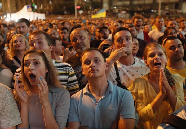Болельщики Украины реагируют во время матча - Sputnik Абхазия