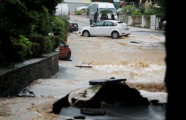 Затопленная улица после проливных дождей в Хагене, Германия. - Sputnik Абхазия