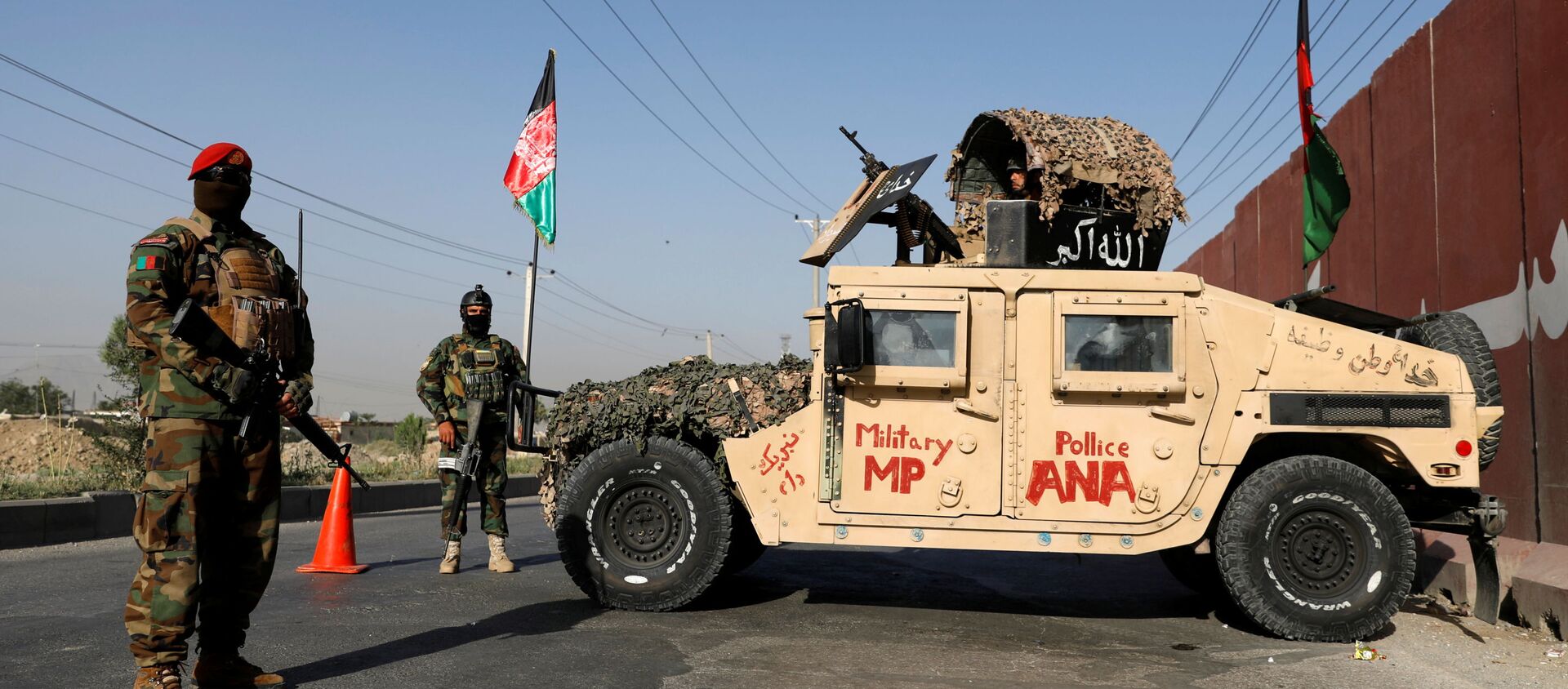 Офицеры Афганской национальной армии несут вахту на контрольно-пропускном пункте в Кабуле, Афганистан, 8 июля 2021 года. - Sputnik Абхазия, 1920, 26.07.2021