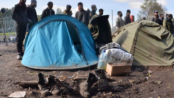 Лагерь беженцев на белорусско-польской границе возле деревни Уснар-Дольное - Sputnik Аҧсны
