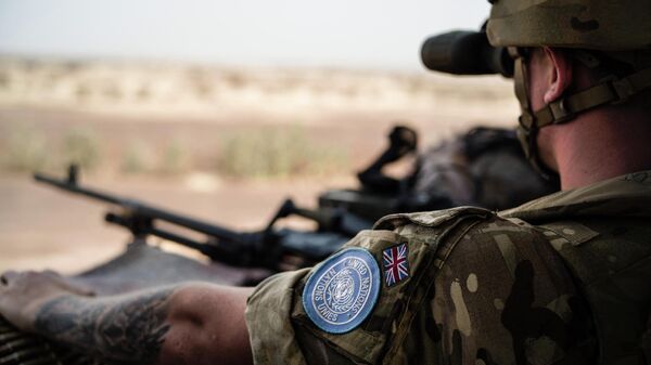 Британский солдат Многопрофильной комплексной миссии Организации Объединенных Наций по стабилизации в Мали - Sputnik Абхазия