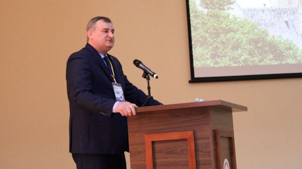 Министр Эдуард Бутба выступил с приветственным словом на  международной конференции в Южной Осетии  - Sputnik Абхазия