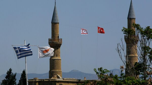 Флаги Греции, Кипра, Турции и Северного Кипра в Никосии. Архивное фото
 - Sputnik Абхазия