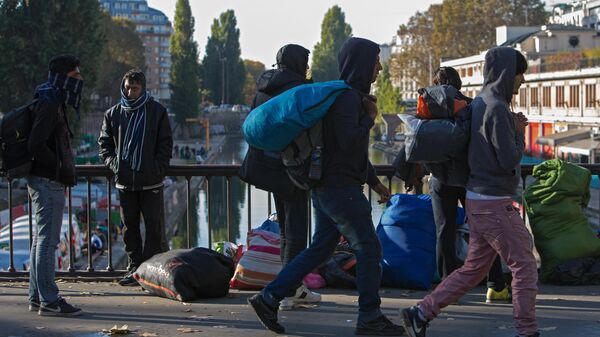 Ситуация в лагере мигрантов в Париже - Sputnik Абхазия