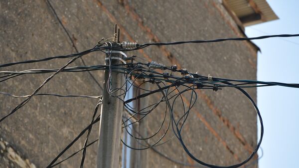 Линии электропроводов  в городе - Sputnik Аҧсны