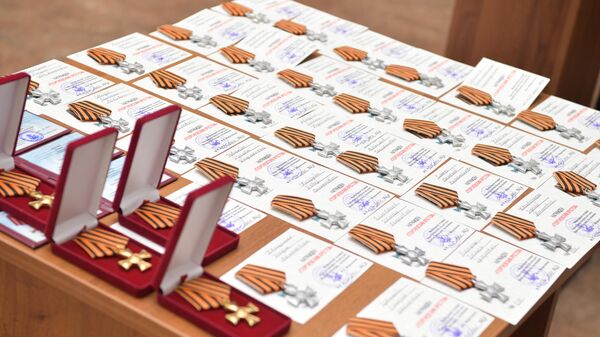 Граждан Абхазии погибших в СВО наградили Георгиевскими крестами посмертно - Sputnik Абхазия