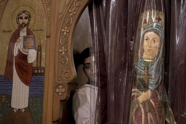 Рождественские службы проходят и в мусульманских странах, в которых живут православные христиане. На фото празднование в Каире, Египте. - Sputnik Абхазия