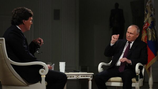 Президент РФ Владимир Путин дал интервью американскому журналисту Такеру Карлсону - Sputnik Абхазия