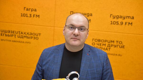 Беслан Барателиа рассказал об участии Абхазии в нумизматической выставке в Гонконге - Sputnik Абхазия