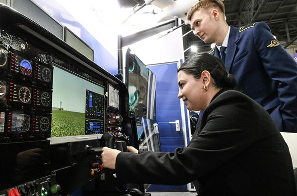 Авиасимулятор на выставке 13-го Национального авиационного инфраструктурного салона в МВЦ "Крокус Экспо" - Sputnik Абхазия