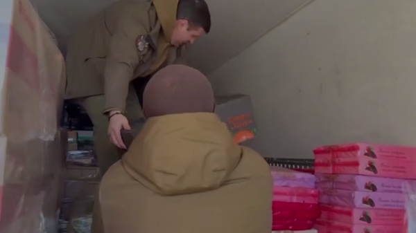 Гумгруз для жителей прифронтовых районов Донбасса доставлен из Абхазии - Sputnik Абхазия