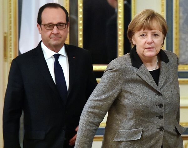 Президент Франции Франсуа Олланд и Федеральный канцлер Германии Ангела Меркель. - Sputnik Абхазия