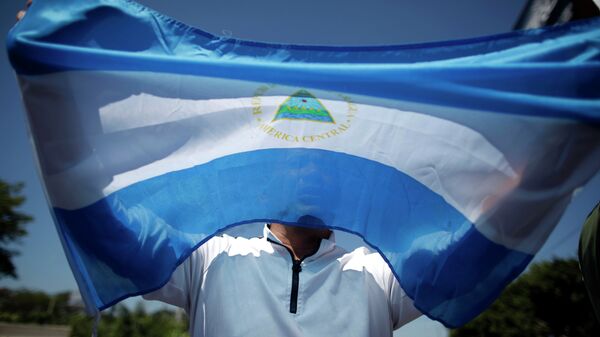Флаг Республики Никарагуа. Архивное фото. - Sputnik Аҧсны