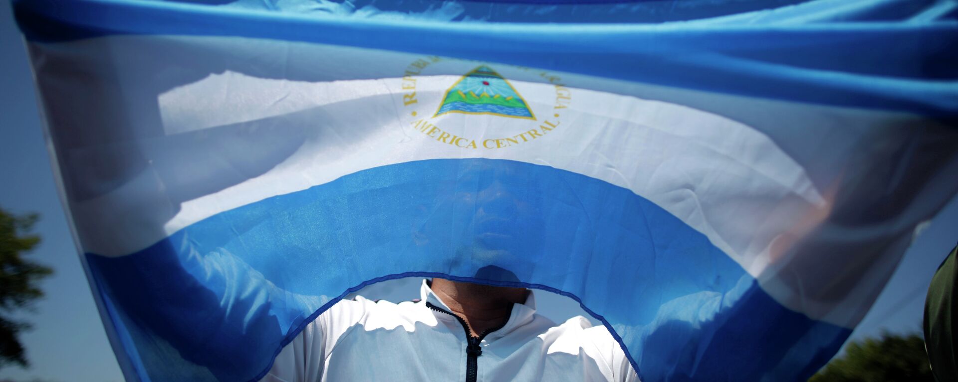 Флаг Республики Никарагуа. Архивное фото. - Sputnik Аҧсны, 1920, 22.07.2023