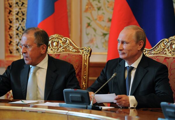 Президент РФ В.Путин и министр иностранных дел С. Лавров. Архивное фото - Sputnik Абхазия