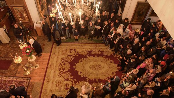 Пасхальное богослужение в Сухумском кафедральном соборе Благовещения Пресвятой Богородицы - Sputnik Аҧсны