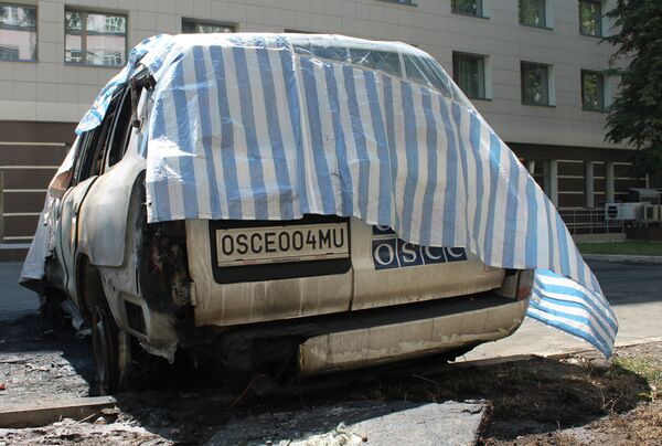 Шесть автомашин миссии ОБСЕ сгорели в Донецке - Sputnik Абхазия