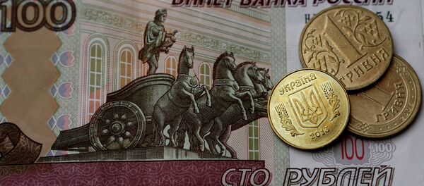 Денежные купюры и монеты России и Украины Денежные купюры и монеты России и Украины - Sputnik Абхазия