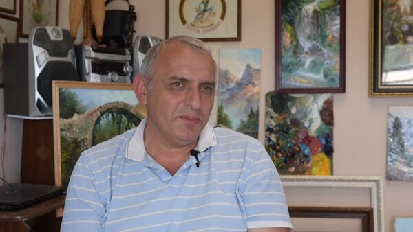 Гарри Дочия, фото для видео - Sputnik Абхазия