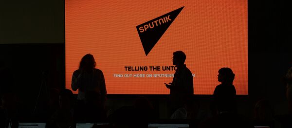 Экран с логотипом и девизом информационного агентства Sputnik Экран с логотипом и девизом информационного агентства Sputnik - Sputnik Абхазия