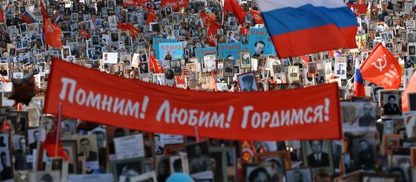 Шествие Региональной патриотической общественной организации Бессмертный полк Москва по Красной площади Шествие Региональной патриотической общественной организации Бессмертный полк Москва по Красной площади - Sputnik Абхазия