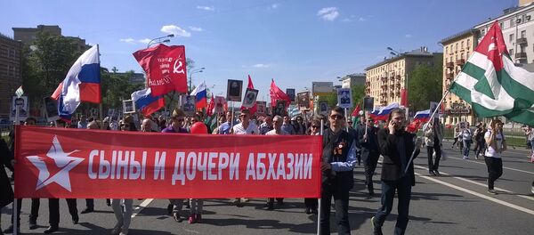 Абхазская диаспора прошла Бессмертным полком в Москве Абхазская диаспора прошла Бессмертным полком в Москве - Sputnik Абхазия
