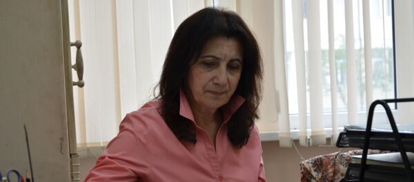 Заведующая отделом кадров АГУ Лариса Махария. Заведующая отделом кадров АГУ Лариса Махария. - Sputnik Абхазия