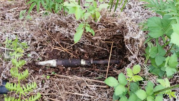 Один из снарядов найденных СГБ РА и пограничной службой ФСБ РФ в Абхазии. - Sputnik Абхазия