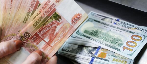 Доллары США и рубли в кассе Доллары США и рубли в кассе - Sputnik Абхазия