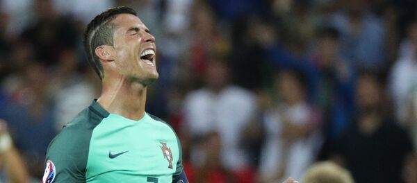 Игрок сборной Португалии Криштиану Роналду радуется победе - Sputnik Абхазия