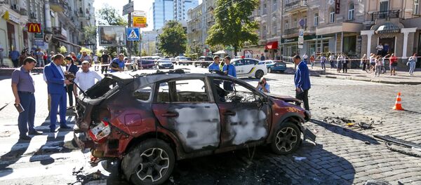 Место взрыва автомобиля, в результате которого погиб журналист Павел Шеремет Место взрыва автомобиля, в результате которого погиб журналист Павел Шеремет - Sputnik Абхазия