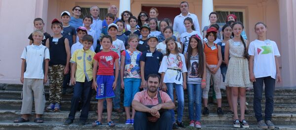 Детский лагерь Апеипш отправился на каникулы на Ауадхару Детский лагерь Апеипш отправился на каникулы на Ауадхару - Sputnik Абхазия