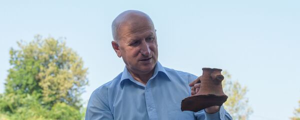 Аҭоурыхтә факультет адекан, аҭоурыхтә ҭҵаарадыррақәа ркандидат Алик Габелиа Аҭоурыхтә факультет адекан, аҭоурыхтә ҭҵаарадыррақәа ркандидат Алик Габелиа - Sputnik Аҧсны