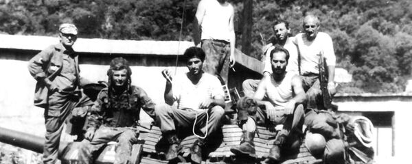 Члены экипажа танка Т55 Сасрыква Члены экипажа танка Т55 Сасрыква - Sputnik Абхазия